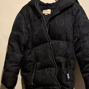 Gucci Dark Puffer Jacket with Logo Pattern